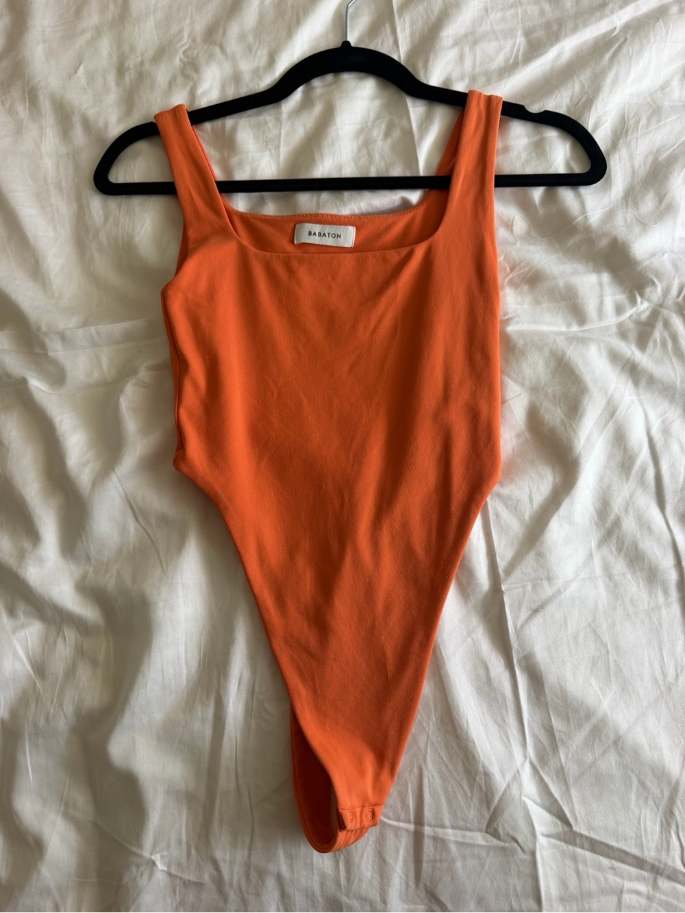 Babaton Orange Stretch Tank One-Piece Bodysuit